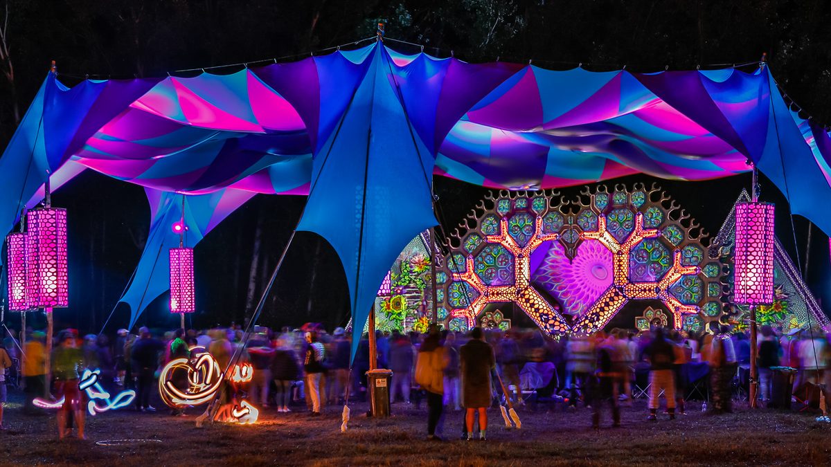 The stage lit up in blue and pink after dark